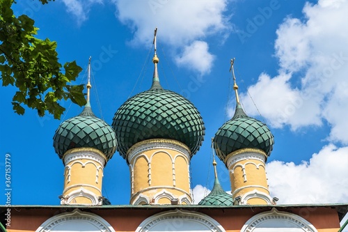 Russia, Uglich, July 2020. The magnificent domes of the Russian Orthodox Church against the blue sky.
