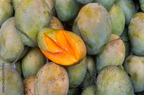 Seasonal delicious sweet mango shop photo