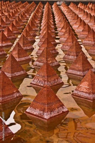 a fountain with a pyramid pattern