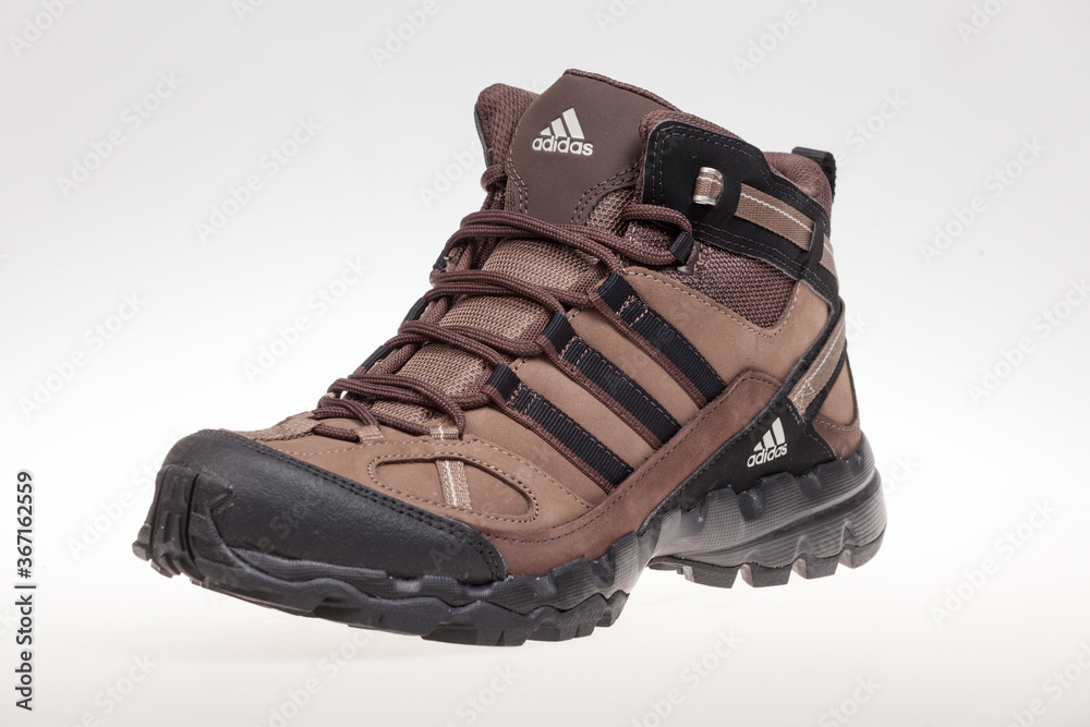 código septiembre Laboratorio Varna , Bulgaria - DECEMBER 13, 2016 : ADIDAS AX1 MID LEA winter shoe.  Product shot. Adidas is a German corporation that designs and manufactures  sports shoes, clothing and accessories Stock Photo | Adobe Stock