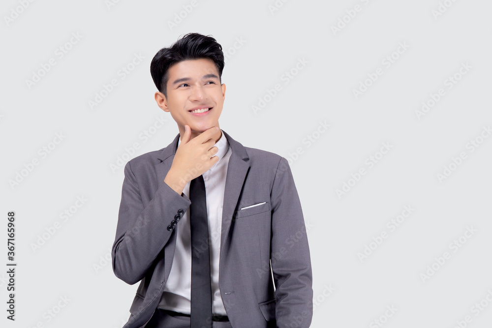 Portrait young asian business man in suit with smart thinking idea isolated on white background, businessman standing and planning for success, handsome manager or executive, emotion and expression.