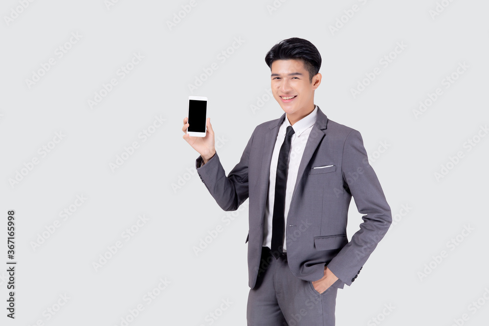 Portrait young asian business man showing and presenting smartphone with blank with success isolated on white background, businessman standing and holding phone, communication concept. Portrait young asian business man showing and presenting smartphone with blank with success isolated on white background, businessman standing and holding phone, communication concept.