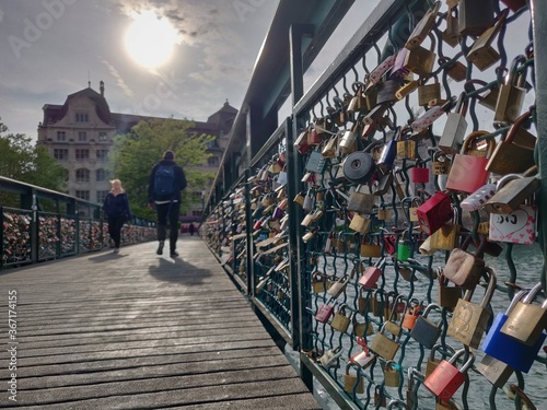 Wallpaper Mural people walking on the Muhlesteg bridge, Love lock bridge over river Limmat, Zurich, Switzerland Torontodigital.ca