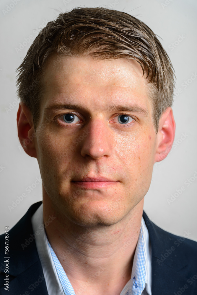 Portrait of young handsome businessman in suit with blond hair Portrait of young handsome businessman in suit with blond hair