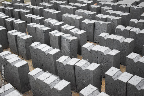 Full frame of fly ash bricks drying in sun heat
