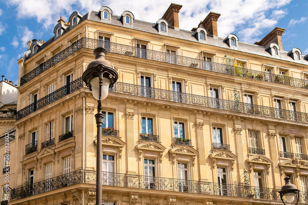 Paris, typical facades and street, beautiful ancient buildings place Saint-Georges
