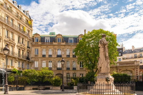 Paris, typical facades and street, beautiful ancient buildings place Saint-Georges

