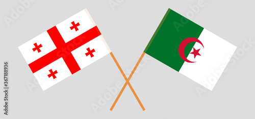 Crossed flags of Algeria and Georgia