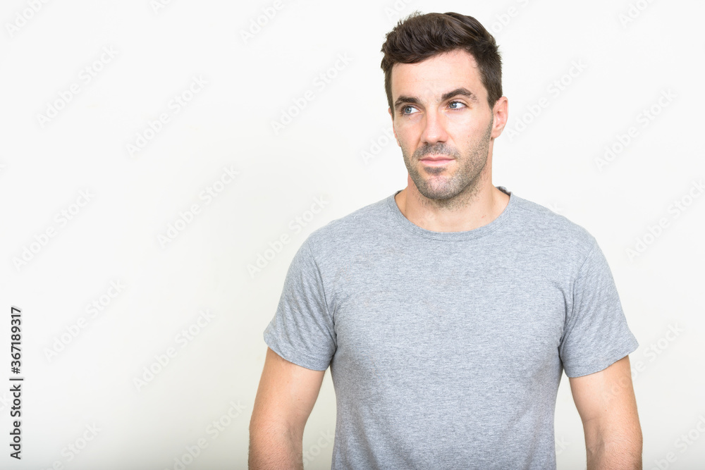 Portrait of handsome Hispanic man with beard stubble Portrait of handsome Hispanic man with beard stubble