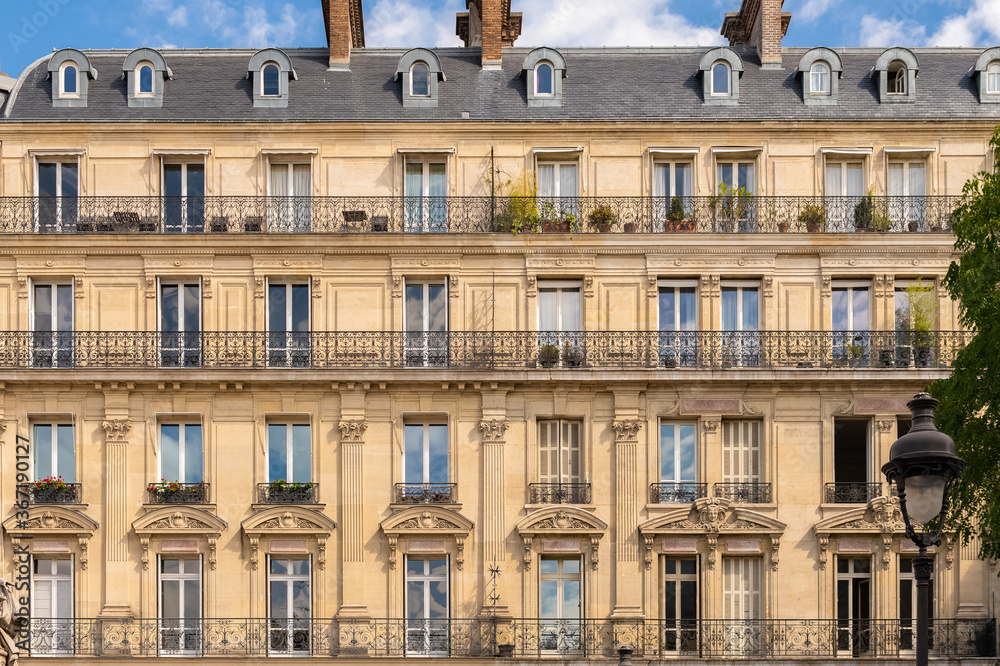 Paris, typical facade, beautiful ancient building