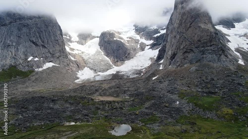 Aerial shot of mountain glaciers in Greenland photo