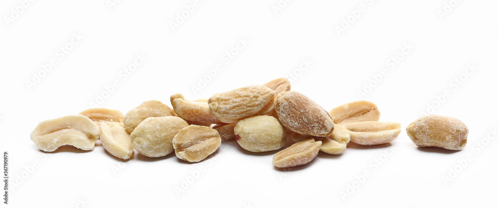 Pile salted and marinated peanuts isolated on white 