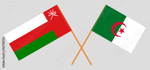 Crossed flags of Algeria and Oman