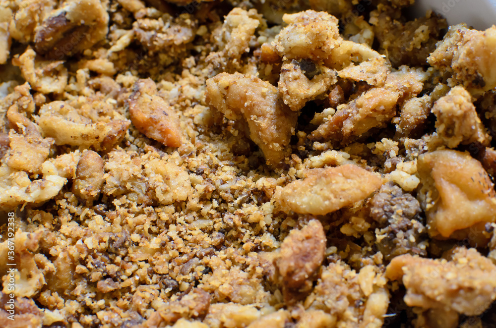 Homemade freshly crispy meaty greaves, picked pork greaves close up. traditional winter food. delicious unhealthy fried pork greaves top view full frame Homemade freshly crispy meaty greaves, picked pork greaves close up. traditional winter food. delicious unhealthy fried pork greaves top view full frame