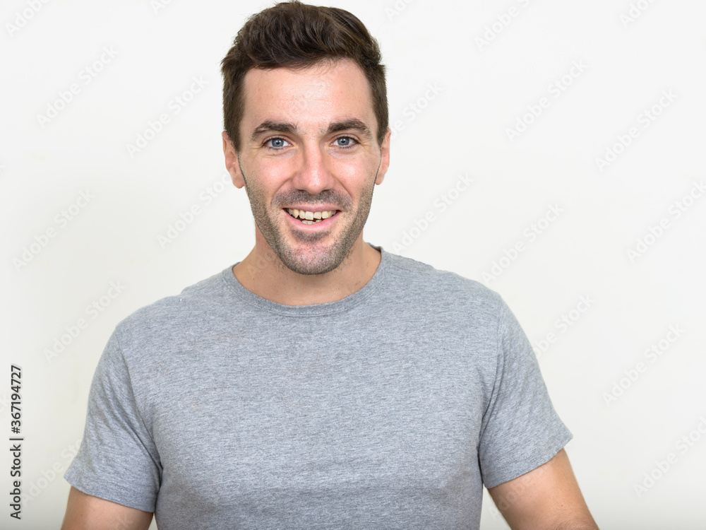 Obraz premium Portrait of handsome Hispanic man with beard stubble