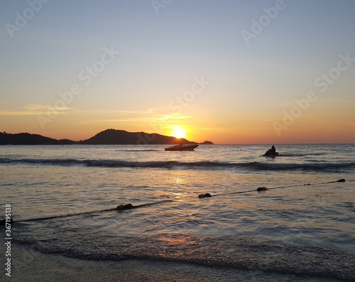 sunset over the sea in Pa Tong