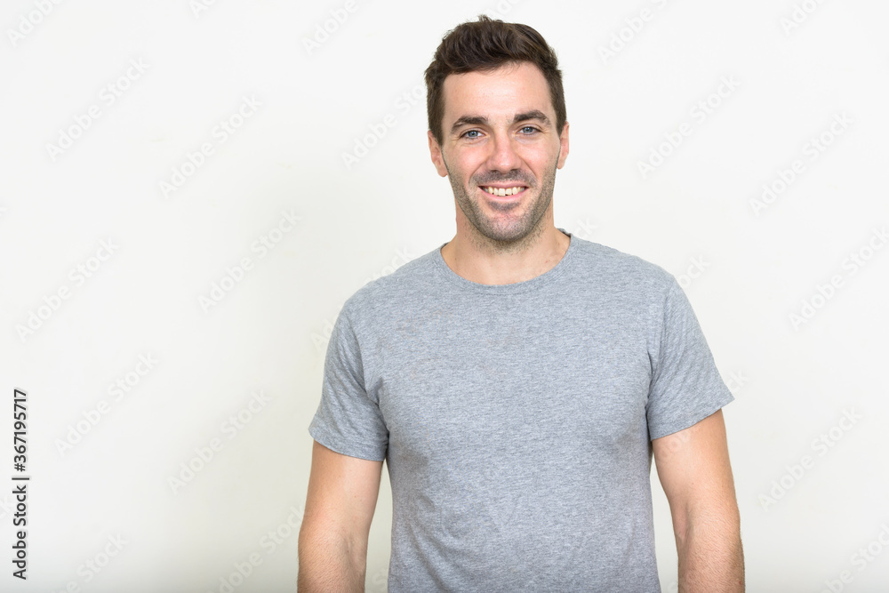 Portrait of handsome Hispanic man with beard stubble Portrait of handsome Hispanic man with beard stubble