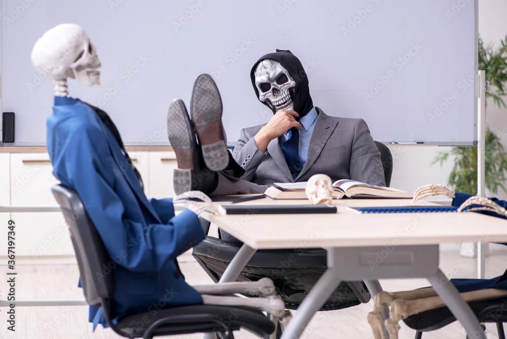Funny business meeting with devil and skeletons Funny business meeting with devil and skeletons