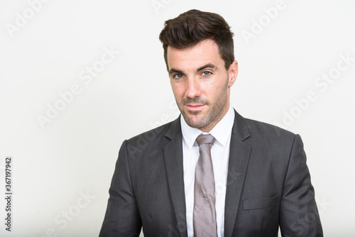 Portrait of handsome Hispanic businessman in suit