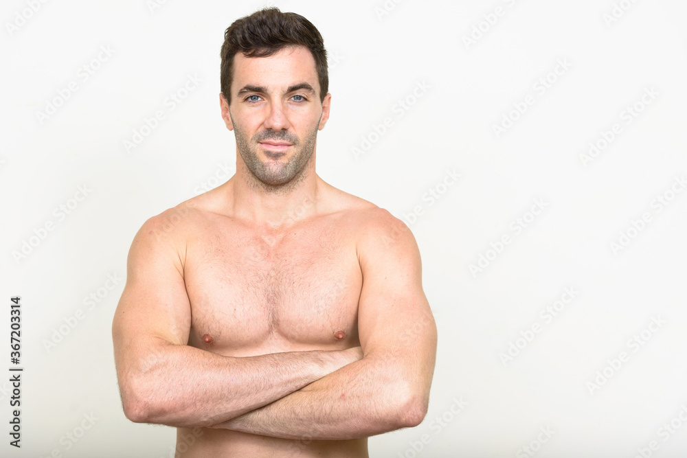 Portrait of handsome muscular Hispanic man shirtless Portrait of handsome muscular Hispanic man shirtless