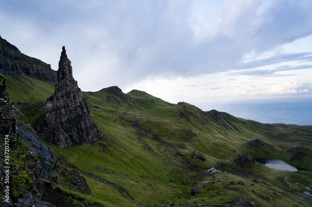 the Old Man of Storr. Hiking in the Quairing Mountains on the Isle of Skye in Scotland the Old Man of Storr. Hiking in the Quairing Mountains on the Isle of Skye in Scotland