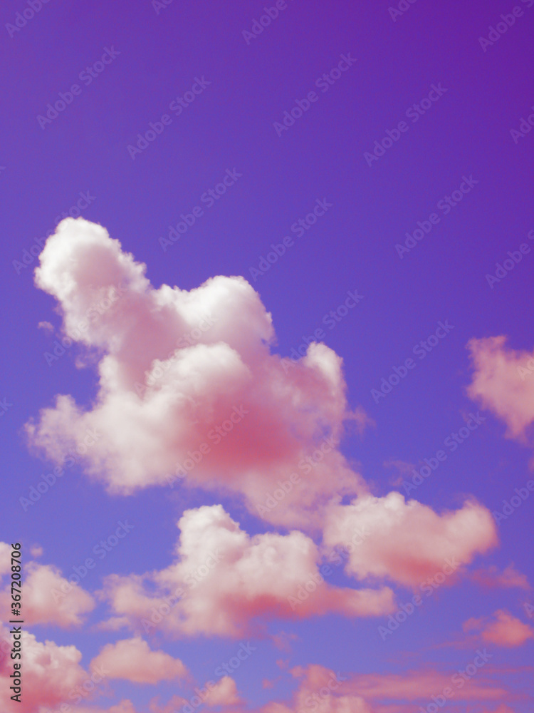 vertical view of red clouds in purple sky