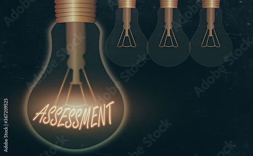 Conceptual hand writing showing Assessment. Concept meaning action or an instance of making a judgment about something Realistic colored vintage light bulbs, idea sign solution photo