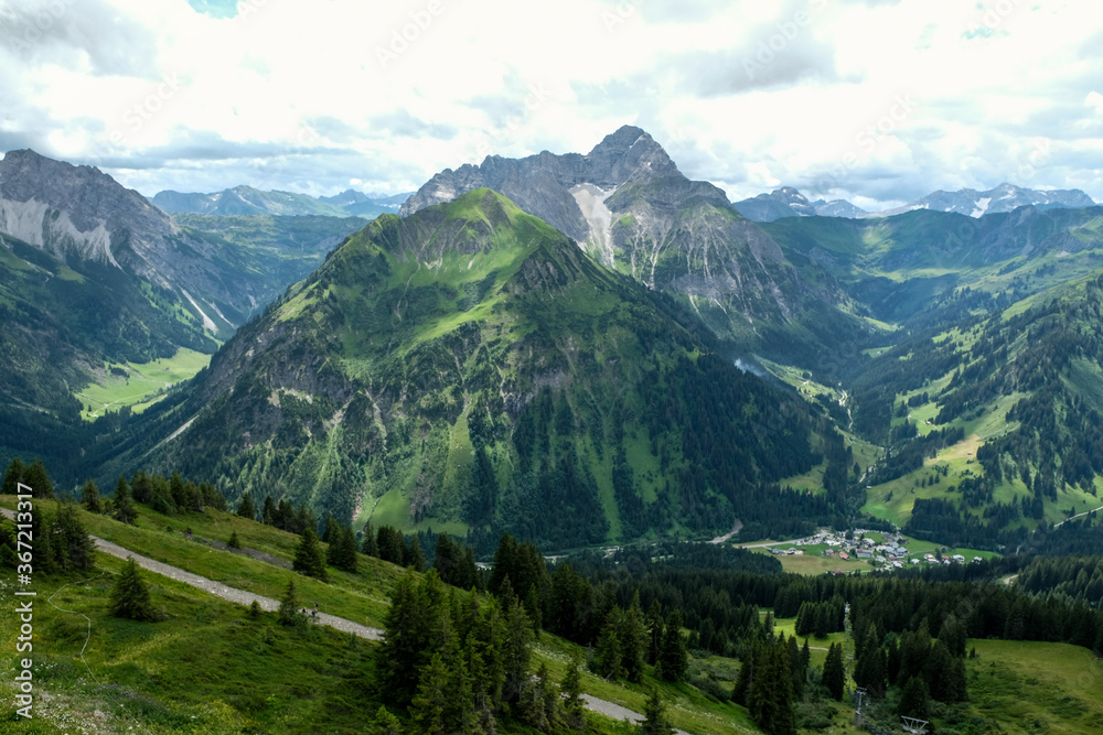 Naklejka premium Panoramic view over the valley of Kleinwalsertal and the allgaeu alps, Kleinwalsertal, Vorarlberg, Austria, Europe