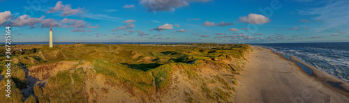 Photo Panoramic aerial view of  Lyngvig lighthouse on wide dune of Holmsland Klit  wit