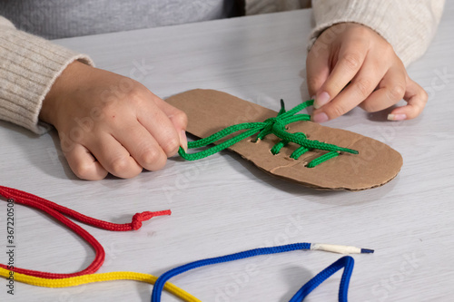 tie shoelace training at home 