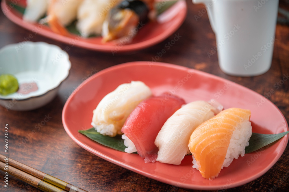 japanese nigiri sushi with plum blossom