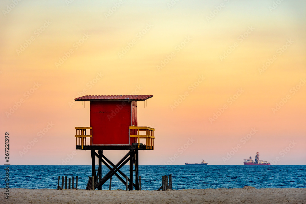 Rescue cabin on Copacabana beach at a tropical sunset on Rio de Janeiro city, Brazil Rescue cabin on Copacabana beach at a tropical sunset on Rio de Janeiro city, Brazil