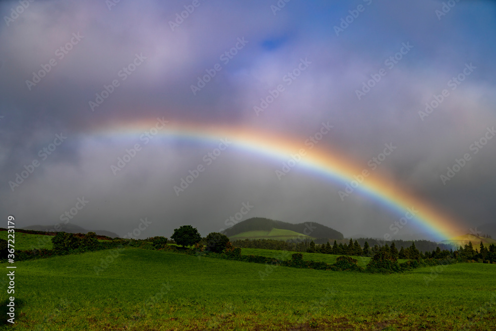 A rainbow over the green field, Sao Miguel, Azores