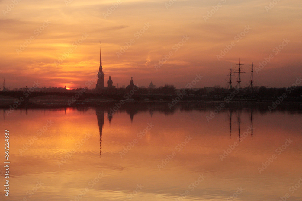 Sunset over Neva river with the silhouette of the Peter and Paul Fortress, Saint Petersburg, Russia