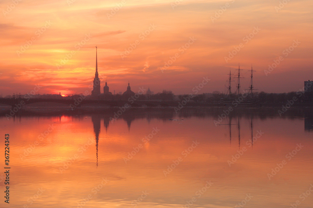 Sunset over Neva river with the silhouette of the Peter and Paul Fortress, Saint Petersburg, Russia