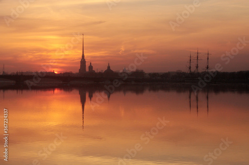 Sunset over Neva river with the silhouette of the Peter and Paul Fortress, Saint Petersburg, Russia