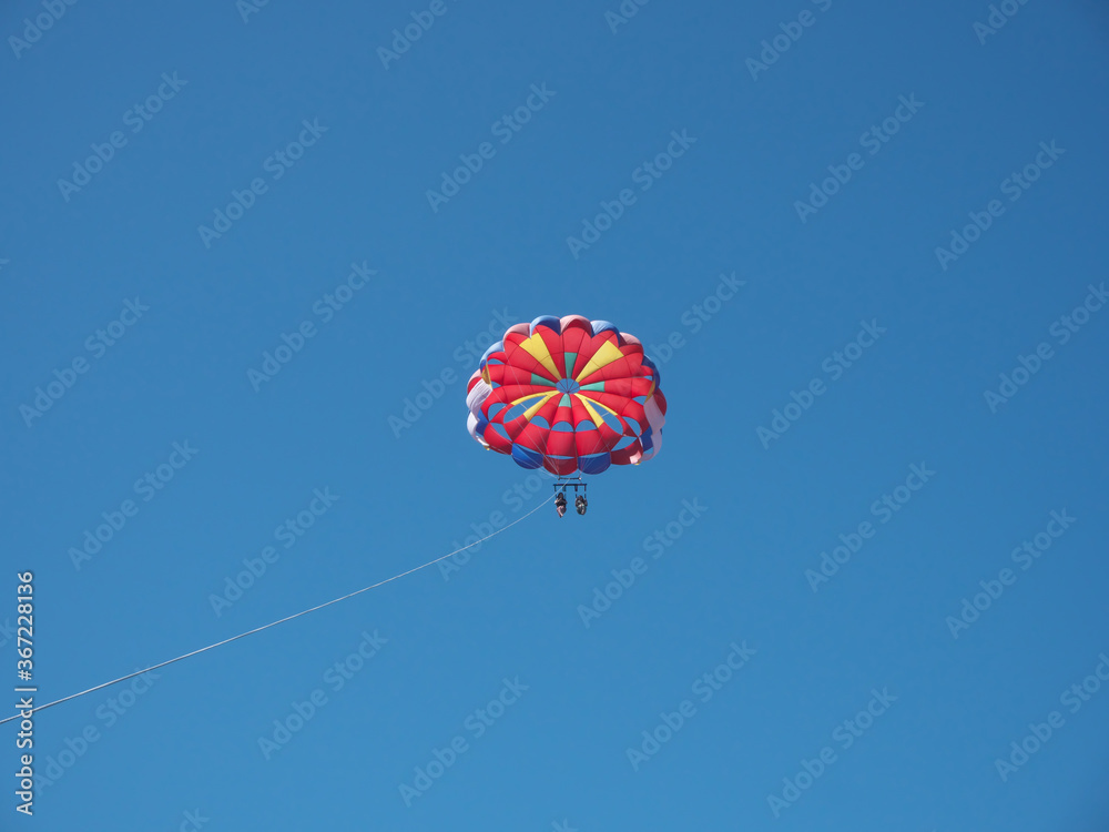 Okinawa,Japan-July 20, 2020: Parasailing on blue sky background at Miyakojima island
Okinawa,Japan-July 20, 2020: Parasailing on blue sky background at Miyakojima island