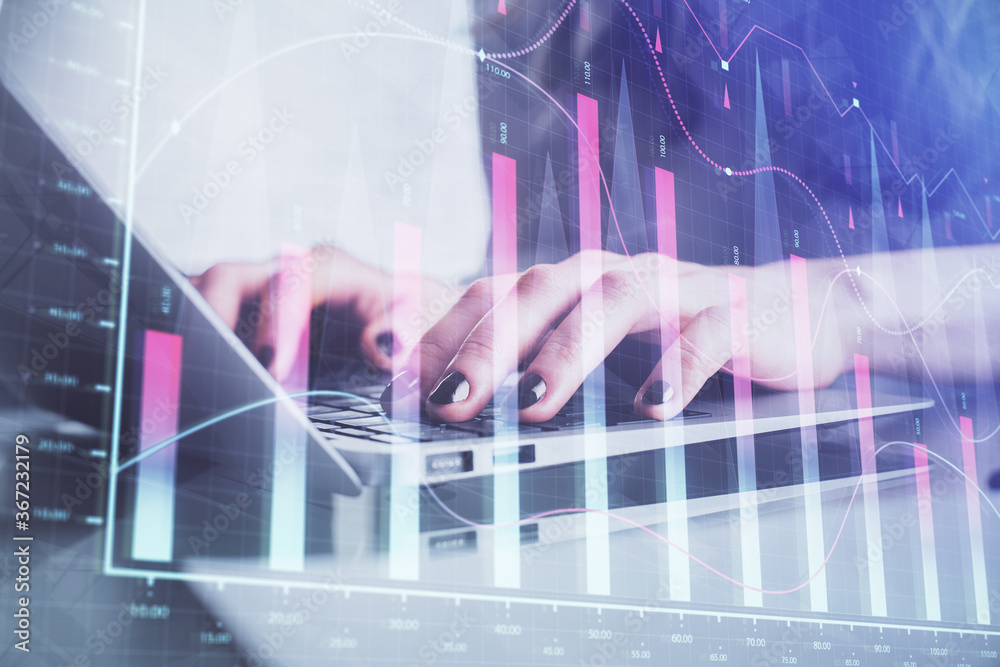 Double exposure of woman hands typing on computer and forex chart hologram drawing. Stock market invest concept. Double exposure of woman hands typing on computer and forex chart hologram drawing. Stock market invest concept.