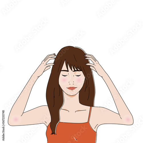 ヘアケア　頭皮マッサージをする女性