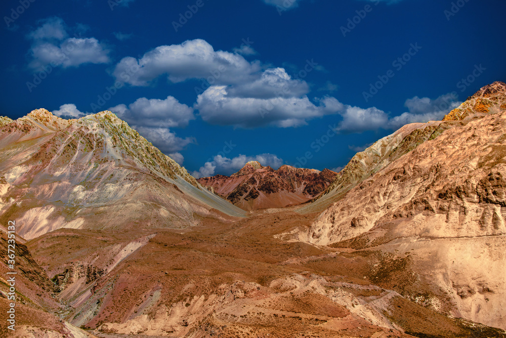mountain landscape with blue sky in the Chilean Andes in late summer