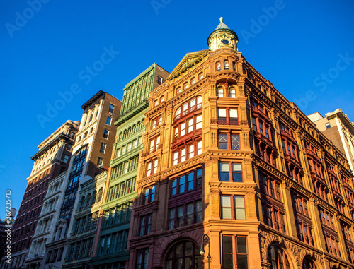 classic brick building facades in New York downtown on Broadway