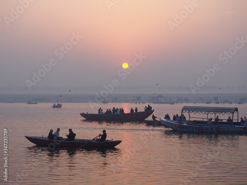 Sunrise over the Ganges River and boats, Varanasi, Uttarpradesh, North India, India