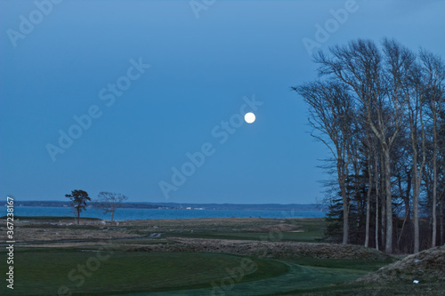 A full moon over the golf course
