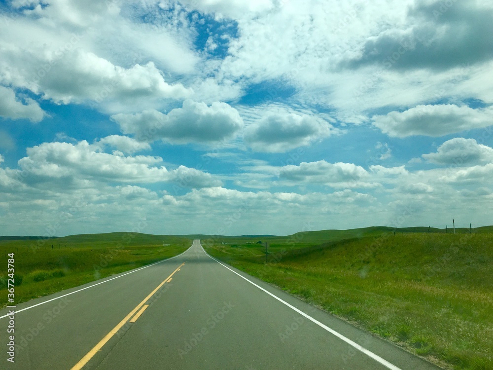 Open road on highway during road trip through rural America Open road on highway during road trip through rural America
