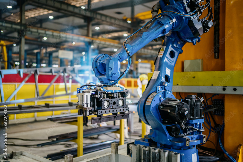 robot arm in factory robot arm in factory
