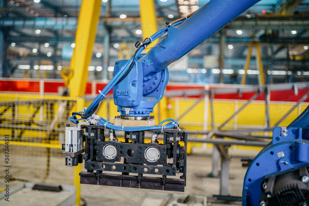 robot arm in factory robot arm in factory