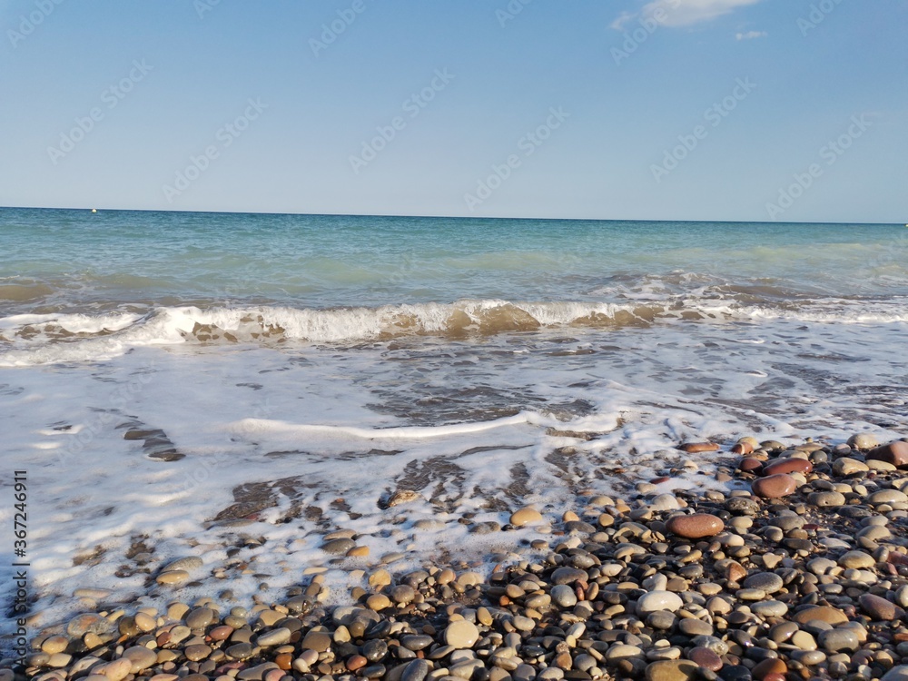 Stone beach and turquoise sea 3