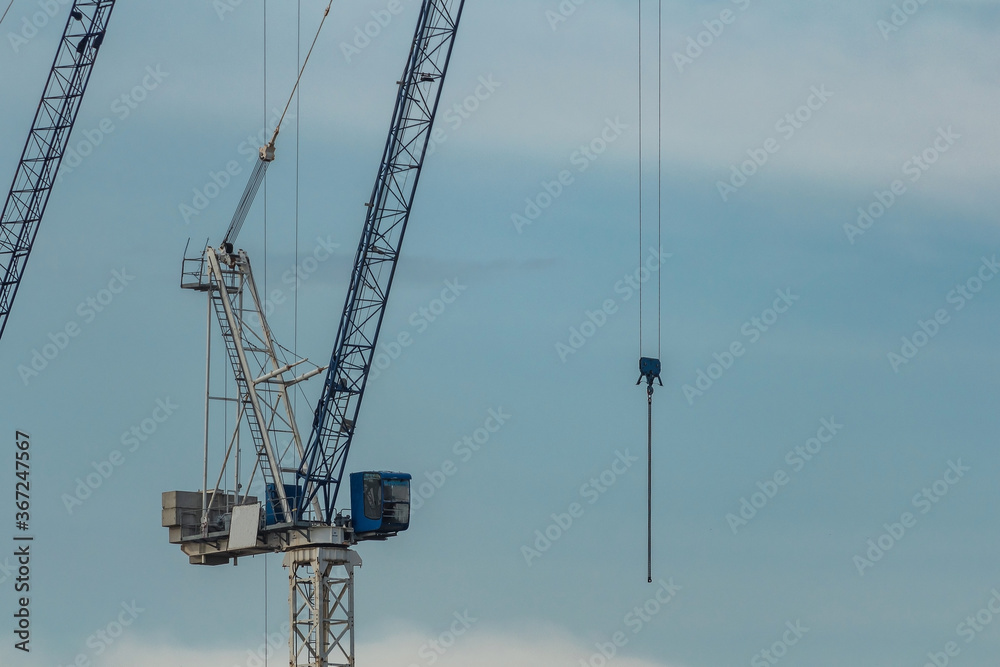 construction crane against blue sky