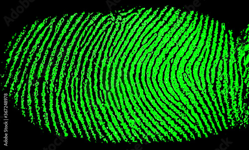 Φωτογραφία a green fingerprint on a black background