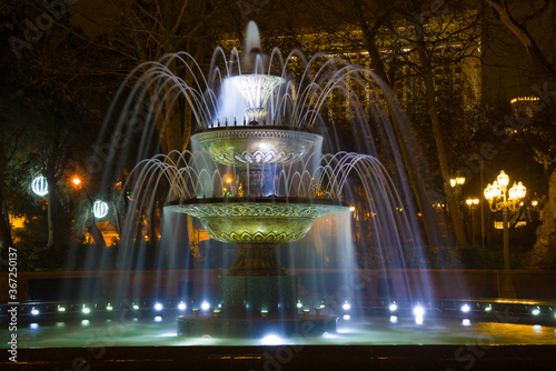 Old fountain in the former Governor's Park (Wahid Park) close-up on a winter night. Baku, Azerbaijan